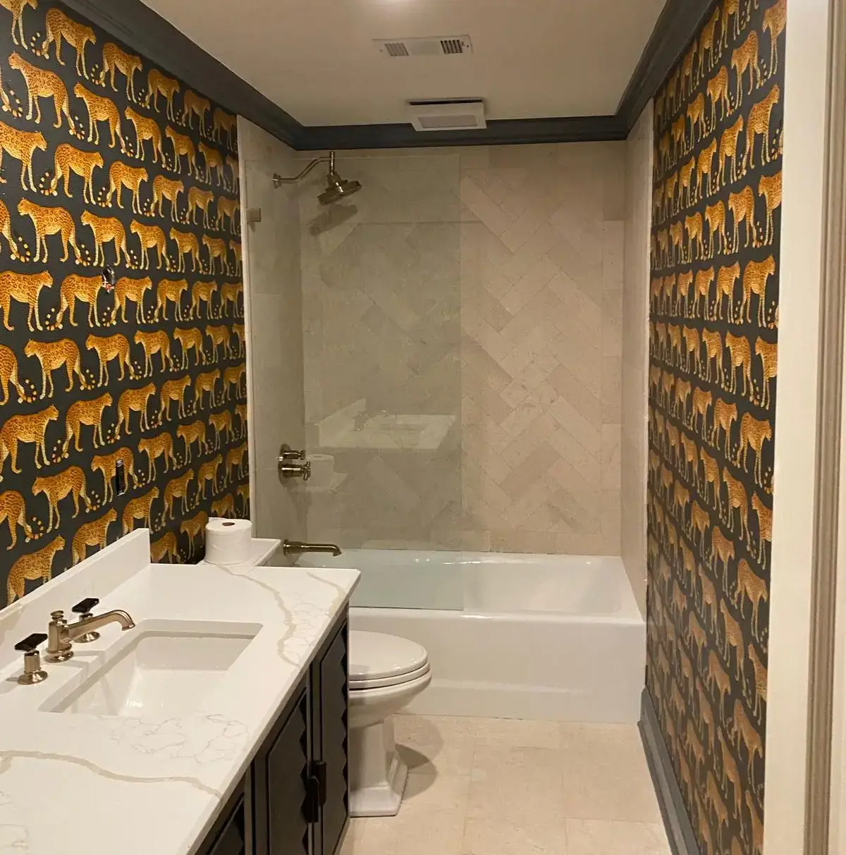 bathroom with leopord wallpaper